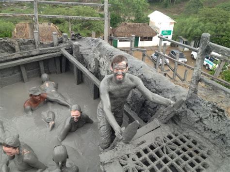 cleaning mud Colombia|Getting Washed At Volcan De Lodo El Totumo.